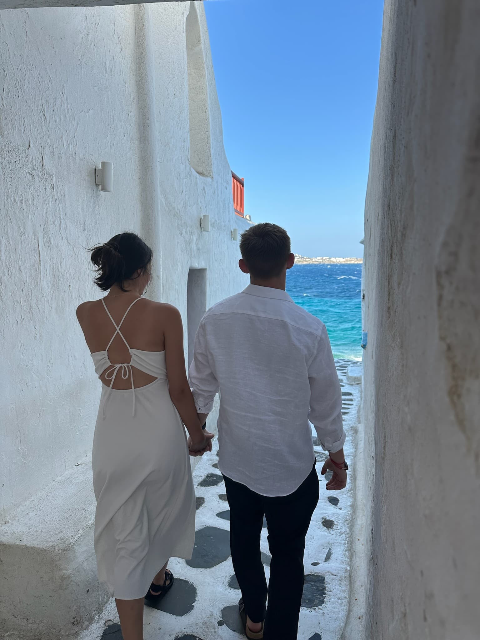 Walking through a Mykonos alley